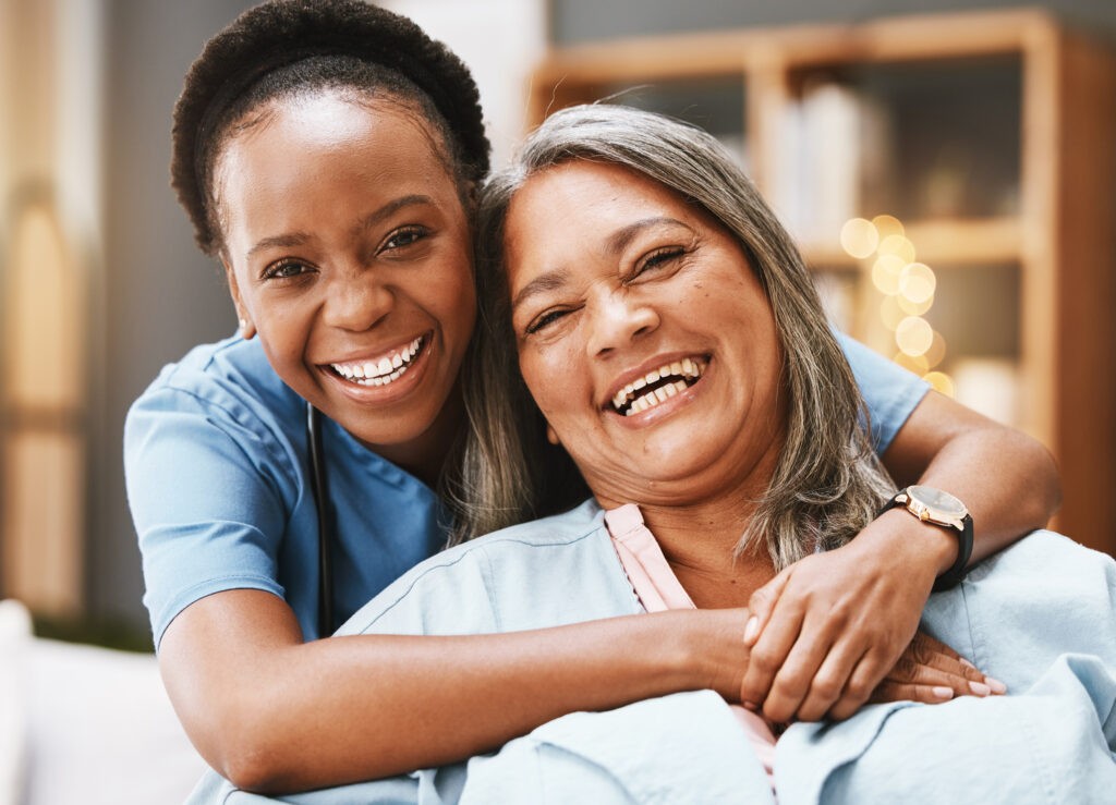 Able Response support worker sharing a warm moment with a client