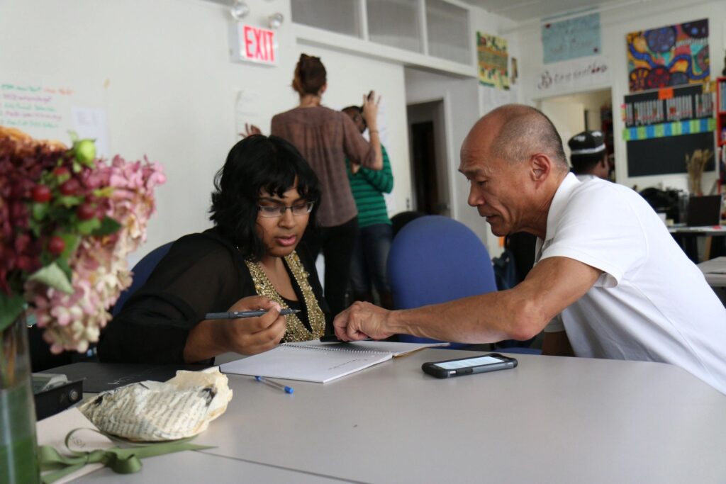 Support coordinator helping a participant with their NDIS plan